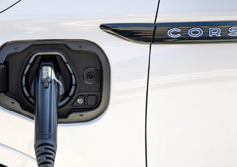 A charging chord is shown connected to a Lincoln Corsair® Grand Touring