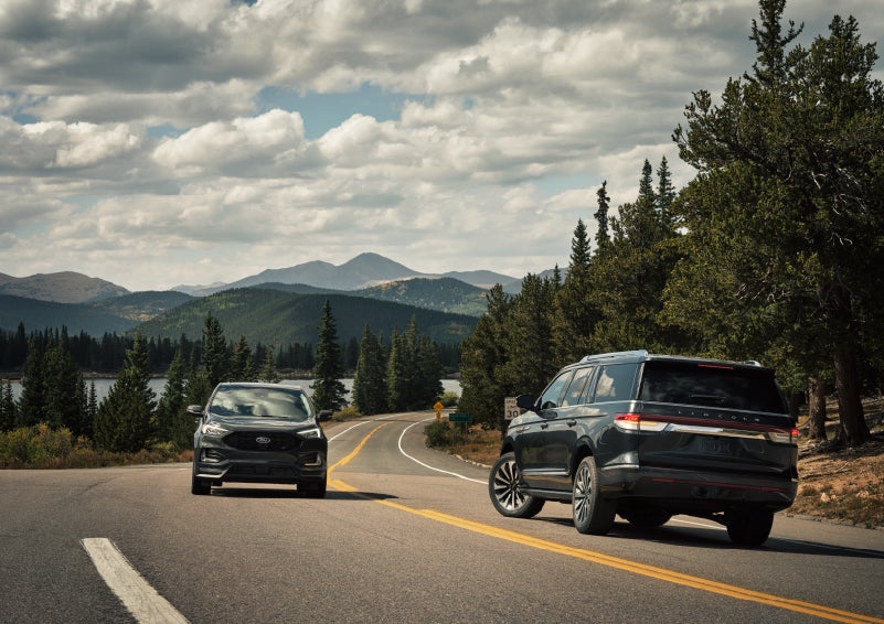 A 2022 Lincoln Navigator SUV is making a left turn as another vehicle approaches from the other lane | Stevens Creek Lincoln in San Jose CA