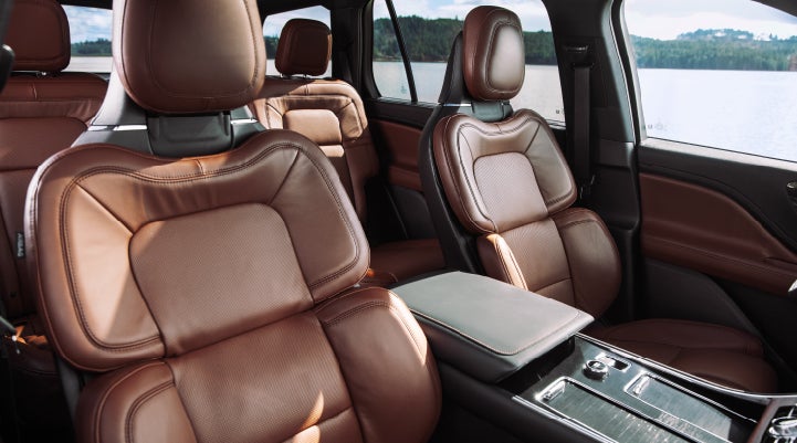 The front row's Perfect Position Seats in a 2024 Lincoln Aviator® Reserve model with Ebony Roast interior | Stevens Creek Lincoln in San Jose CA
