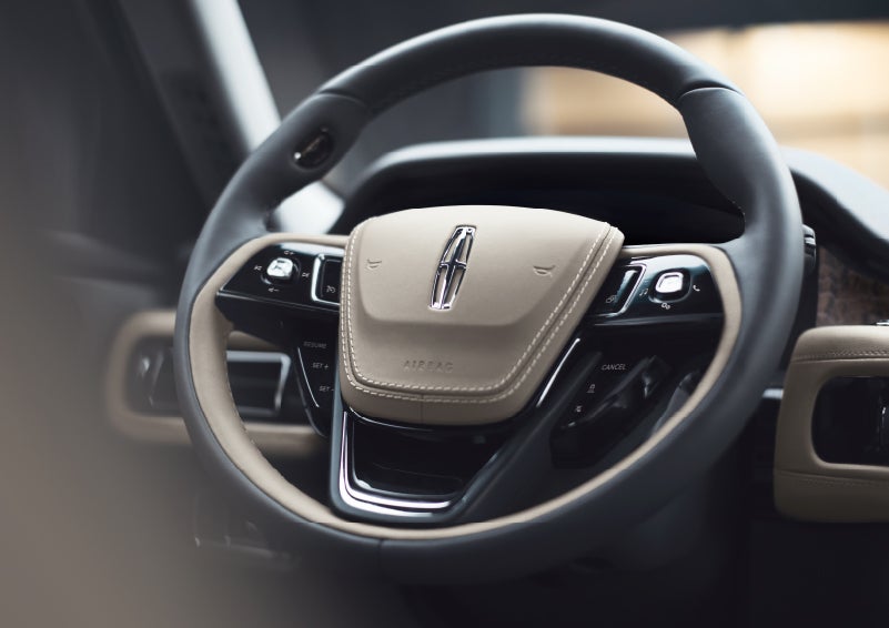The intuitively placed controls of the steering wheel on a 2024 Lincoln Aviator® SUV | Stevens Creek Lincoln in San Jose CA