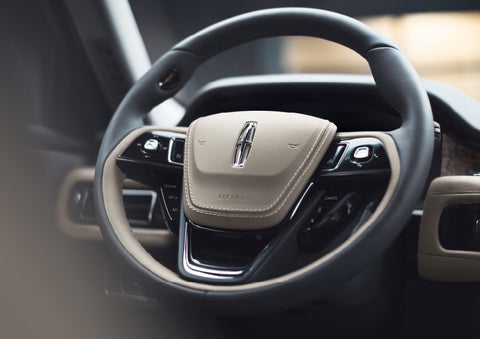 The intuitively placed controls of the steering wheel on a 2024 Lincoln Aviator® SUV | Stevens Creek Lincoln in San Jose CA
