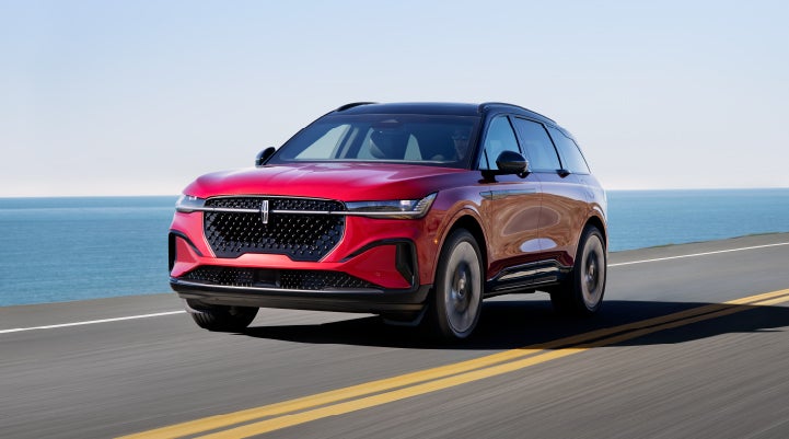 A 2024 Lincoln Nautilus® SUV is being driven on a seaside roadway. | Stevens Creek Lincoln in San Jose CA