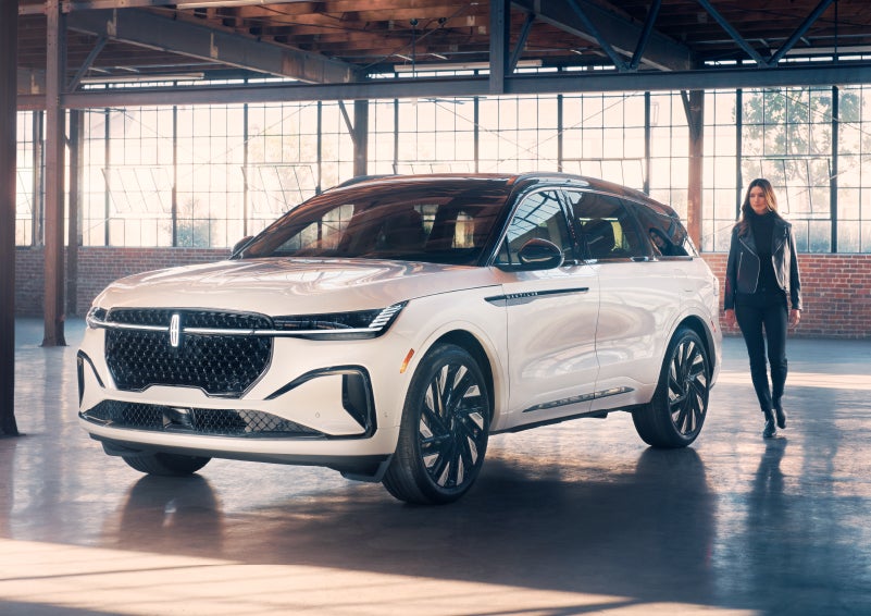A person approaches a 2024 Lincoln Nautilus® SUV. | Stevens Creek Lincoln in San Jose CA