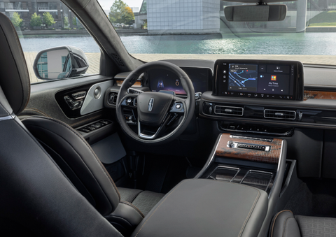 The interior of the 2025 Lincoln Aviator® SUV is shown parked with a view of a harbor through the windshield. | Stevens Creek Lincoln in San Jose CA