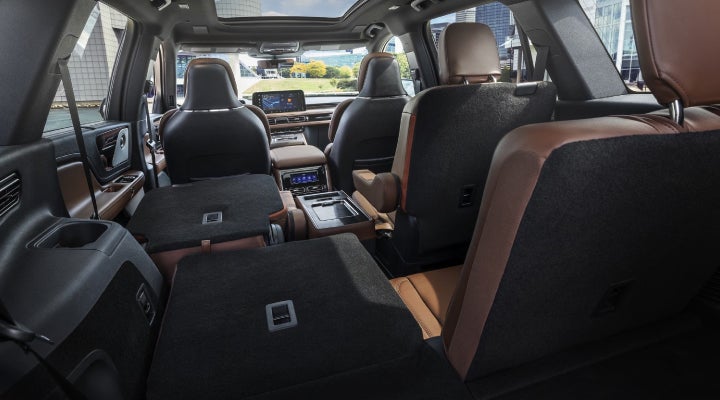 One side of the PowerFold® third-row seat and a second-row seat are folded forward in the 2026 Lincoln Aviator® SUV. | Stevens Creek Lincoln in San Jose CA