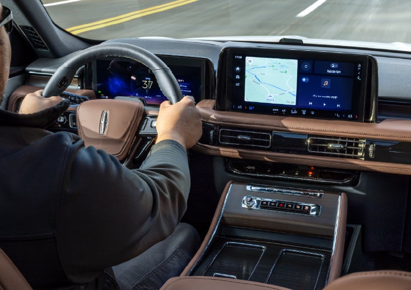 A person is driving a 2026 Lincoln Aviator® SUV as seen from inside the cabin. | Stevens Creek Lincoln in San Jose CA