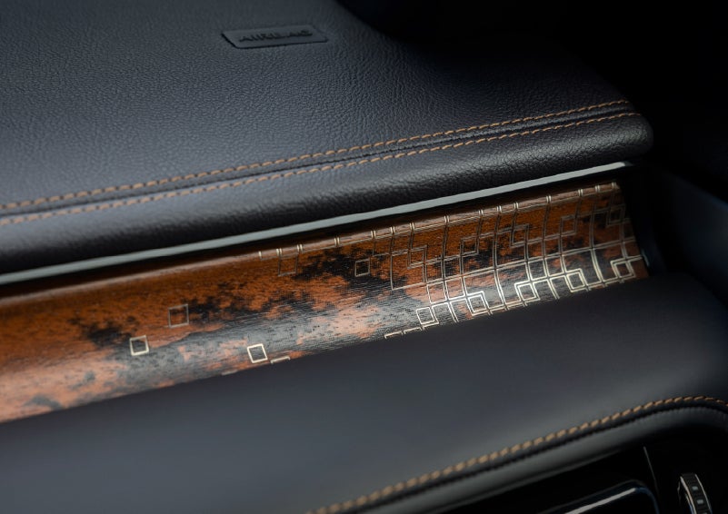 A close-up shot of the 2026 Lincoln Aviator® dashboard with unique black and brown accents and brown stitching. | Stevens Creek Lincoln in San Jose CA