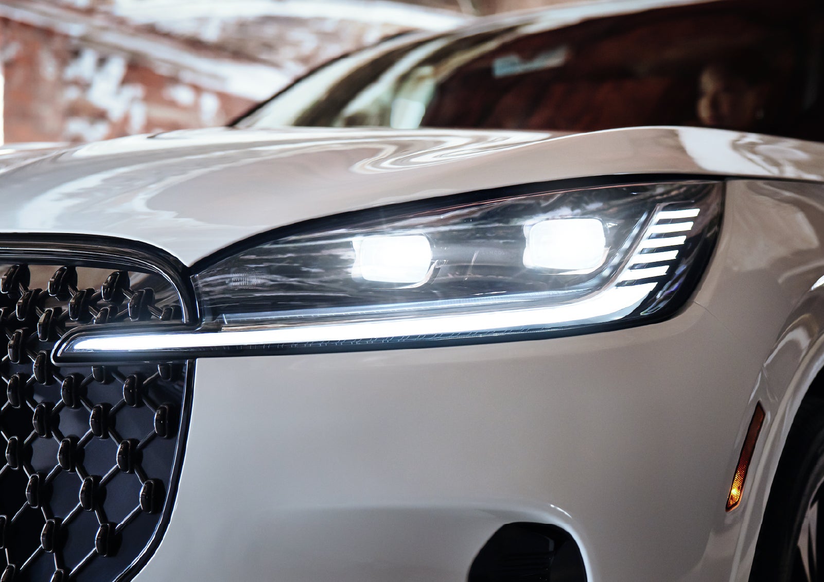 A close-up of a headlamp on the 2027 Lincoln Aviator® SUV is shown. | Stevens Creek Lincoln in San Jose CA