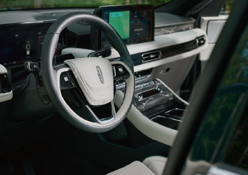 The leather-trimmed steering wheel of a 2027 Lincoln Aviator® Black Label™ SUV. | Stevens Creek Lincoln in San Jose CA