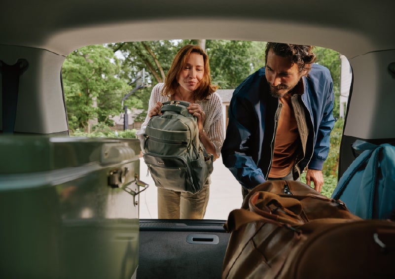 A couple loads luggage into the rear of a 2027 Lincoln Aviator® Black Label™ SUV..e 202 | Stevens Creek Lincoln in San Jose CA